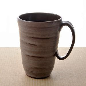 Clay mug handmade by Dixie Baker